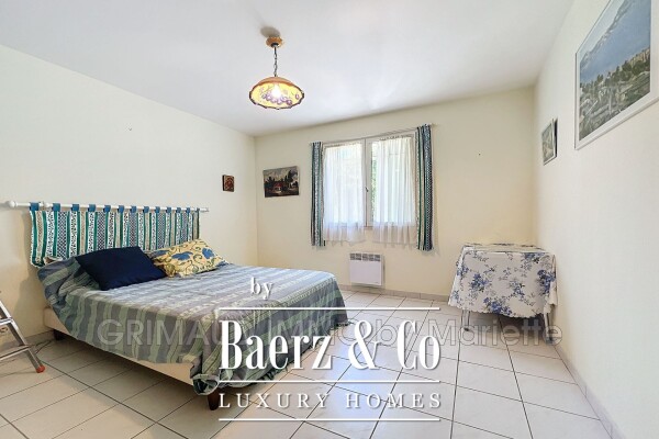 photo 17 Single-story home in a quiet area with a pool, 4 bedrooms, a