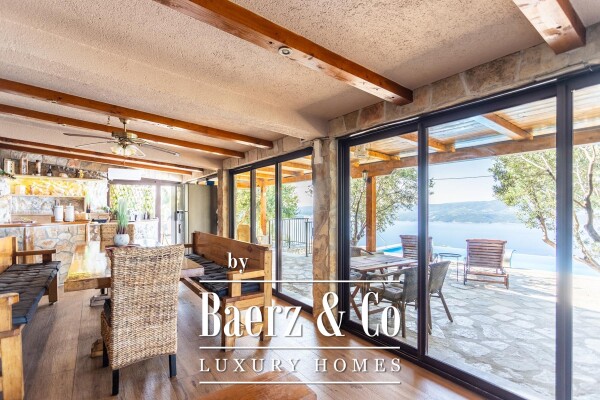 photo 6 Omiš, Stanići, a beautiful house with a sea view, total living area of 160 m² on a land plot of 2546